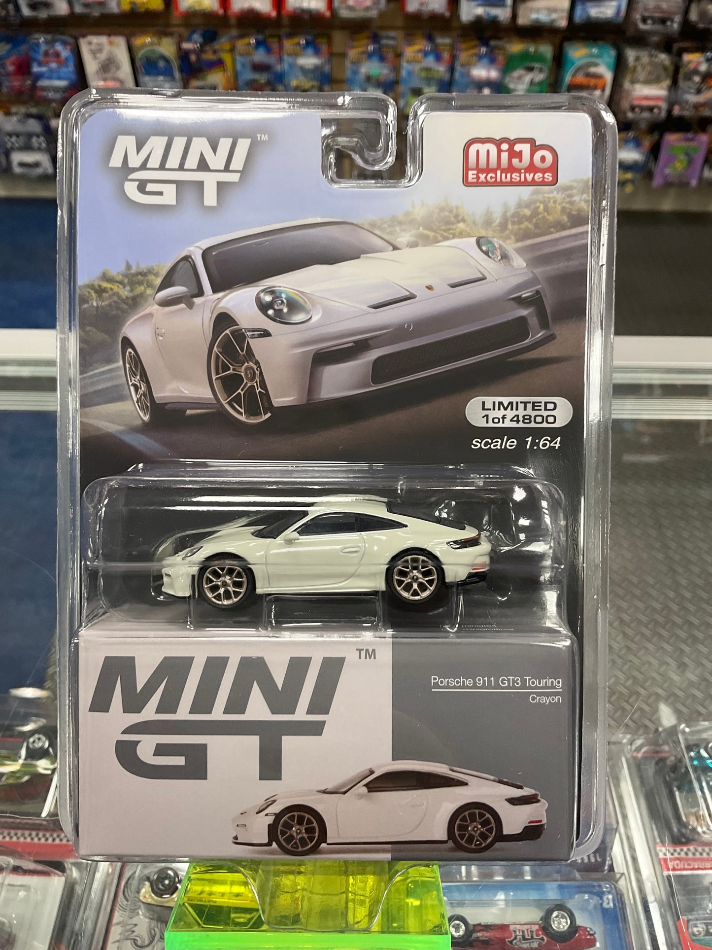 Mini GT 675 Porsche 911 GT3 Touring Crayon