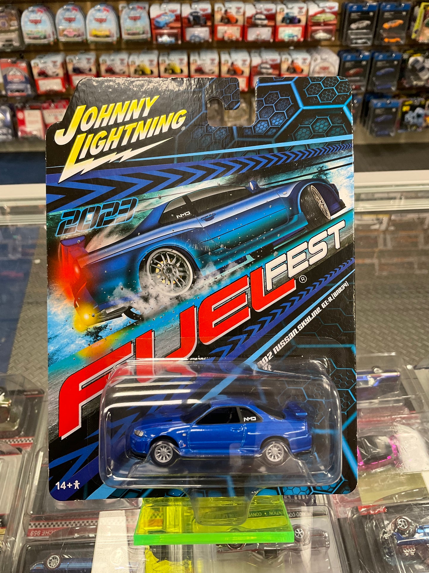 Johnny Lightning 2023 Fuel Fest 2002 Nissan Skyline GT-R (BNR34)