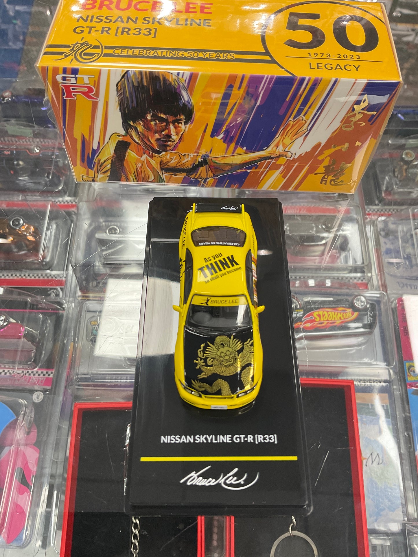 Inno64 Bruce Lee Nissan Skyline GT-R R33 Yellow/Black