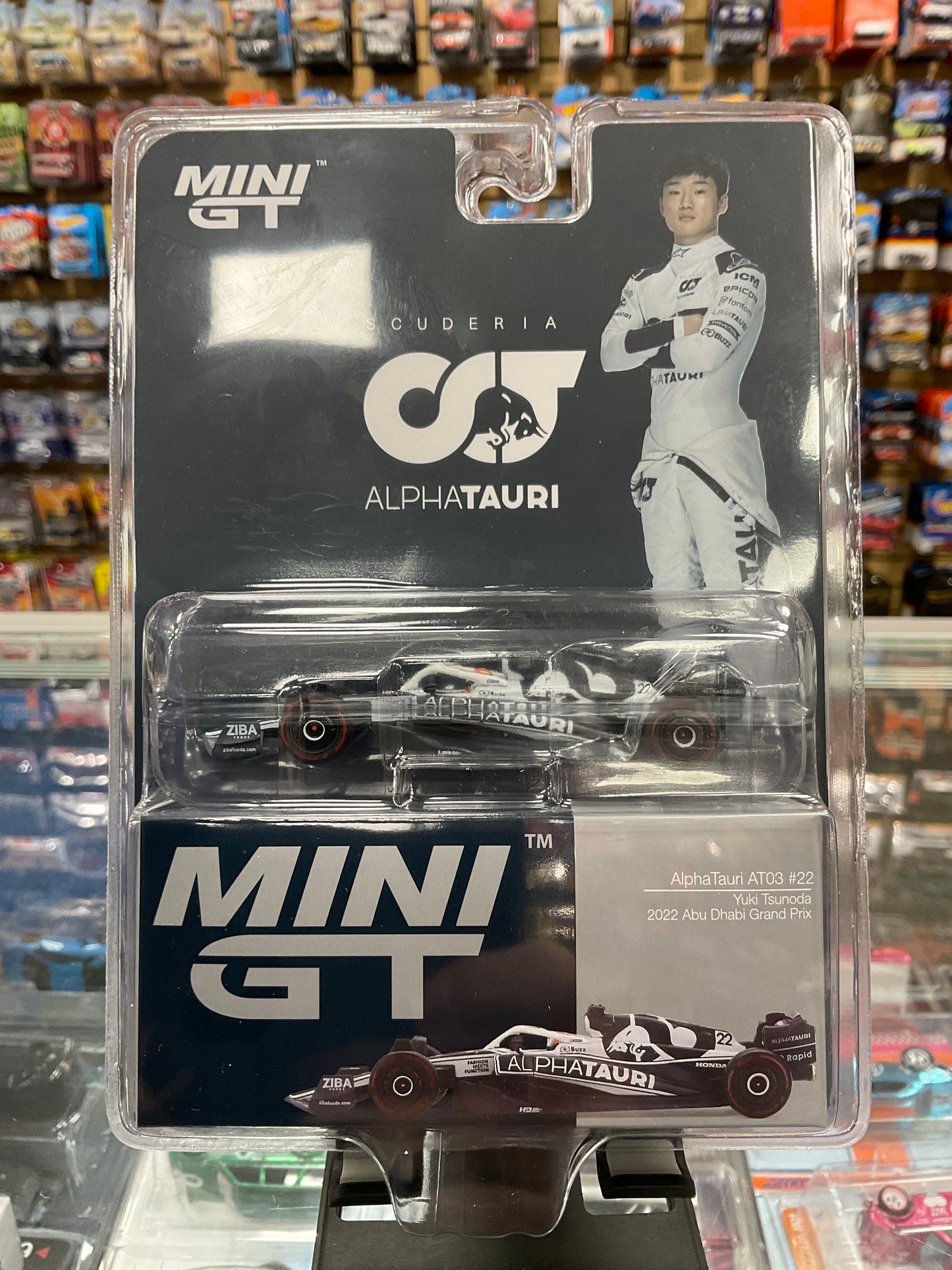 MiniGT 521 AlphaTaurinAT03 #22 Yukon Tsunoda 2022 Abu Dhabi Grams Prix