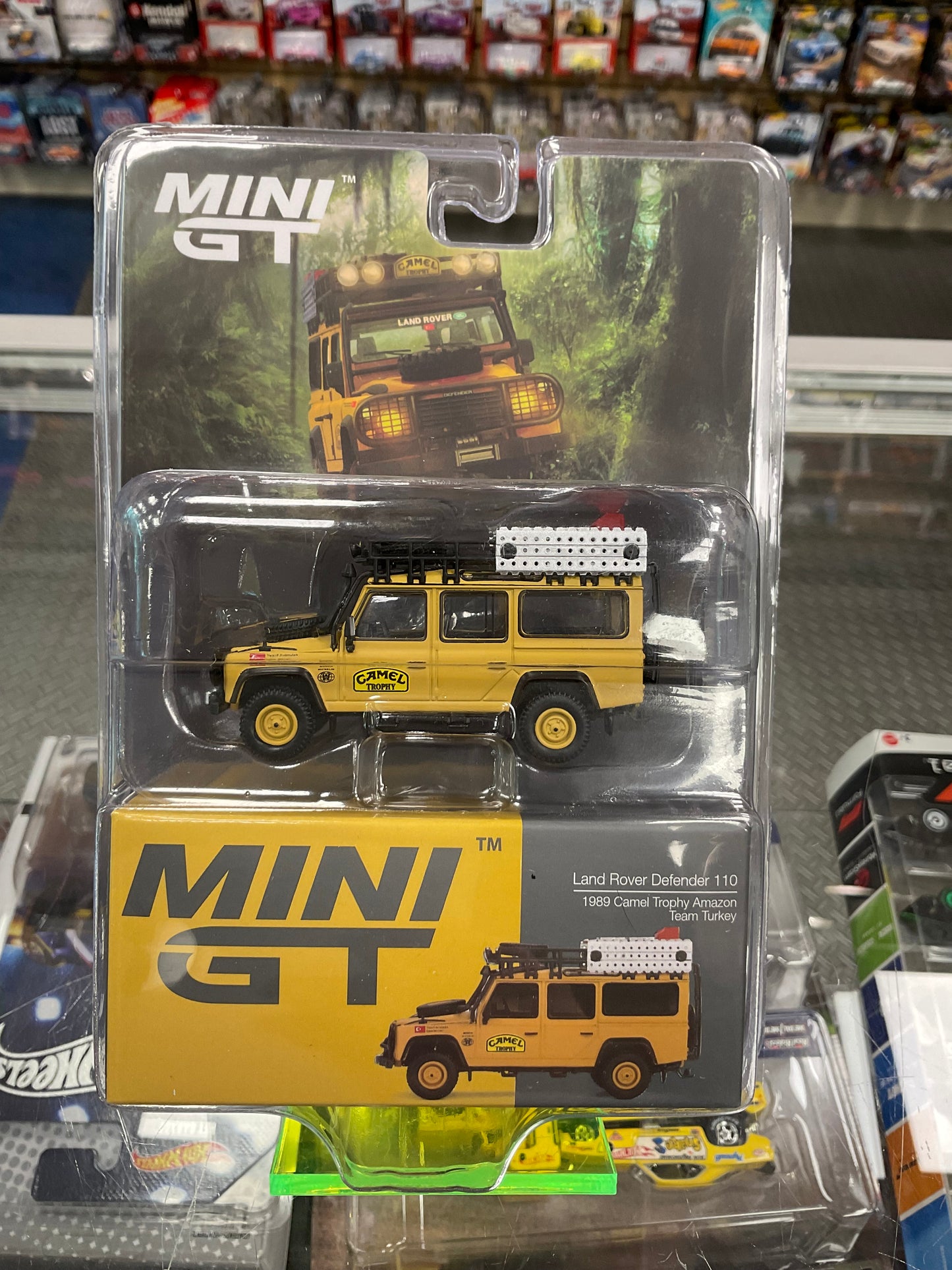 Mini GT 856 Land Rover Defender 110 1989 Camel Trophy Amazon Team Turkey