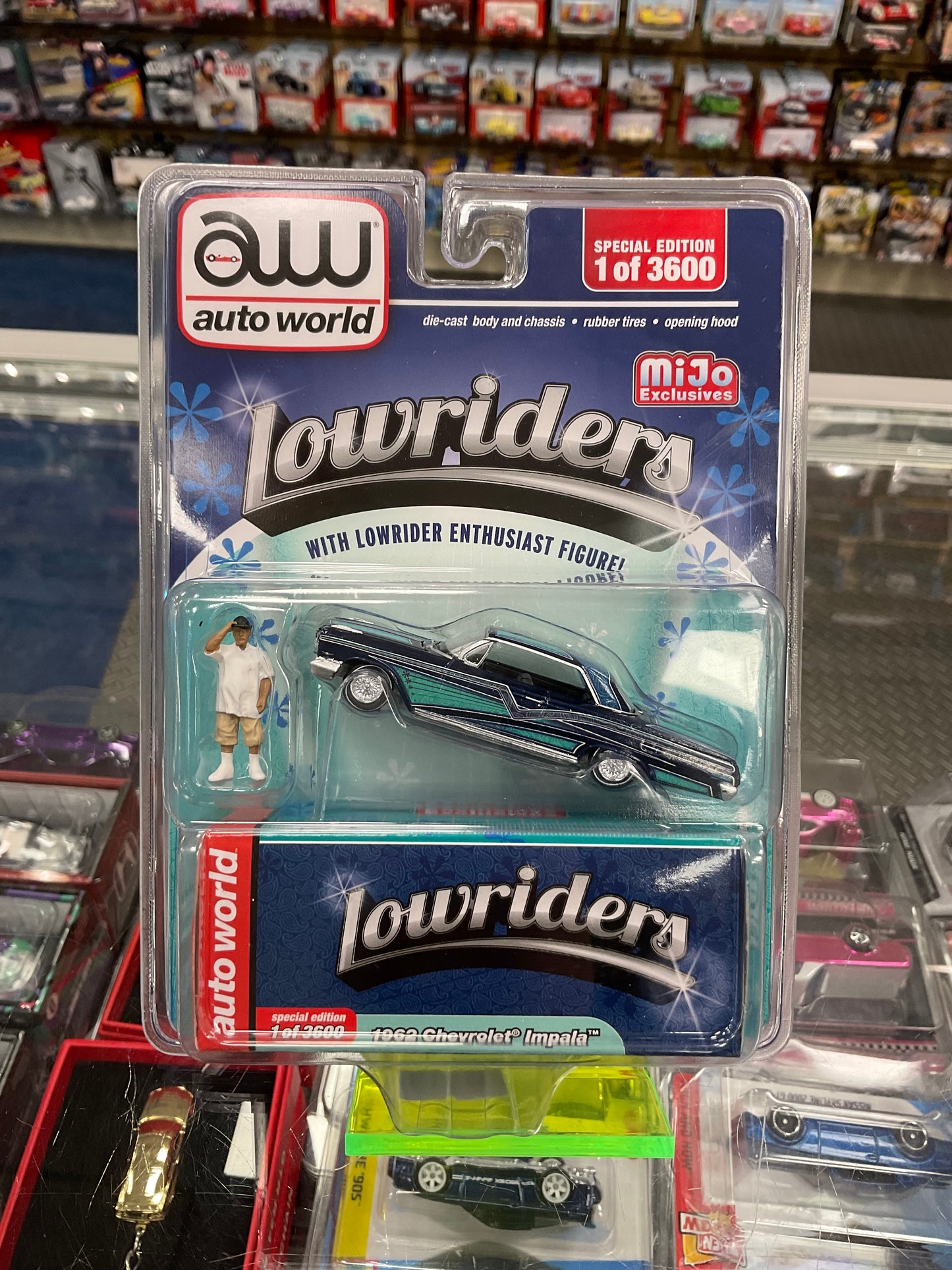 Auto World Lowriders with Figure 1962 Chevrolet Impala Blue/Teal