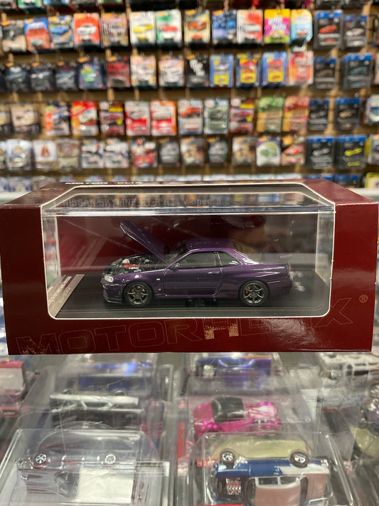 MotorHelix Nissan Skyline GTR R34 V Spec II opening hood midnight purple