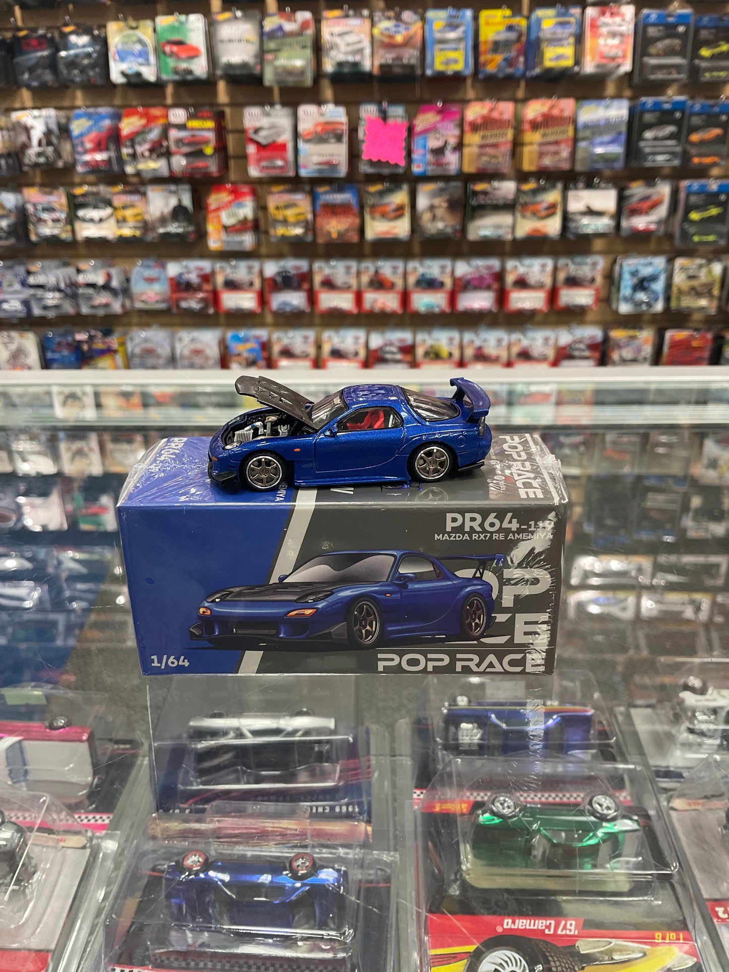 Pop Race PR64-119 Mazda RX7 RE Amemiya Blue